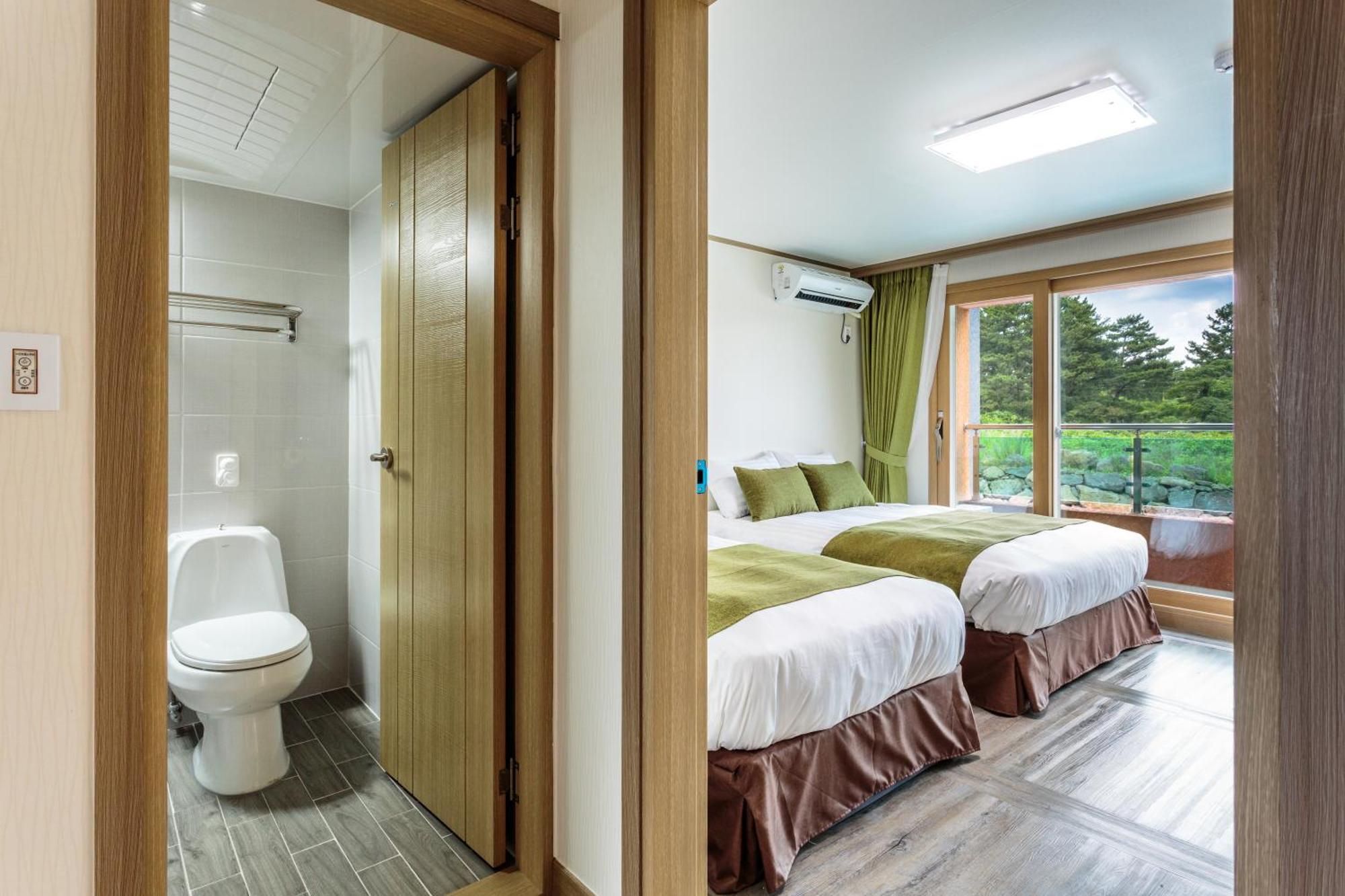 Suandsu Resort Jeju Værelse billede
